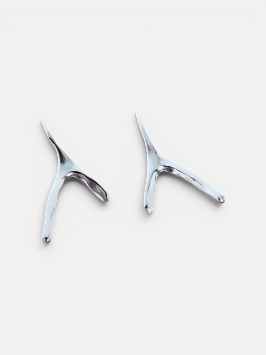Wishbone lokkar